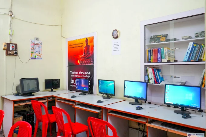 Computer lab with study material at OmegA