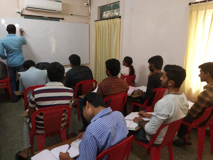 Faculty solving problems for engineering students